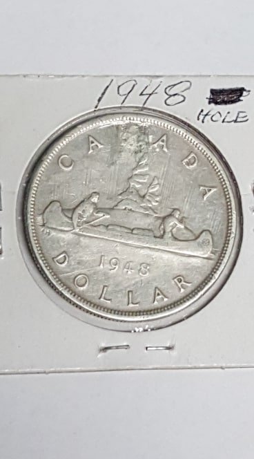 1948-Impaired-Silver-Dollar-Value?